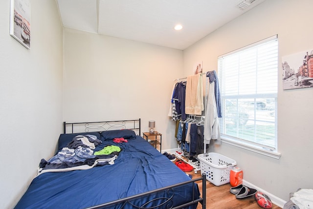 bedroom featuring hardwood / wood-style floors