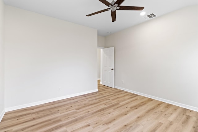 unfurnished room with ceiling fan and light hardwood / wood-style floors