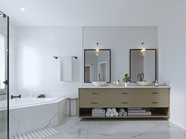 bathroom featuring vanity and tiled bath