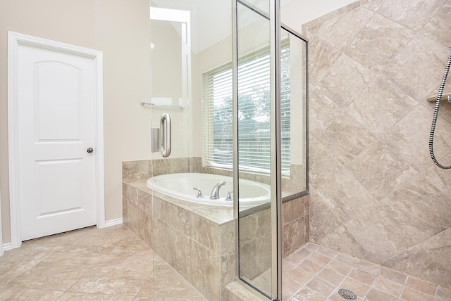 bathroom with tile patterned floors and plus walk in shower