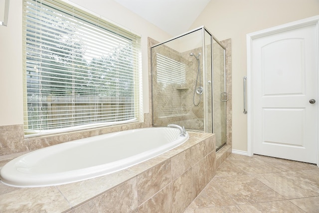 bathroom featuring plenty of natural light, plus walk in shower, and lofted ceiling