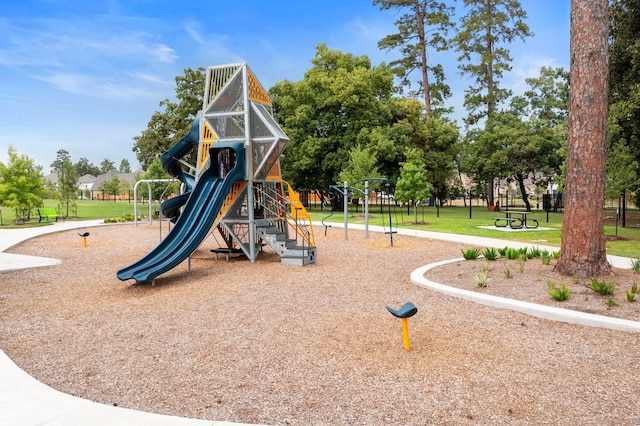 view of playground featuring a lawn