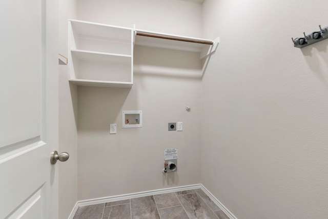 laundry room with hookup for a washing machine, hardwood / wood-style flooring, gas dryer hookup, and electric dryer hookup