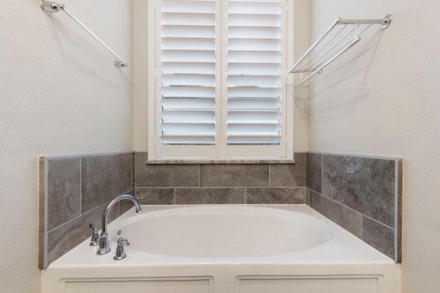 bathroom featuring a tub