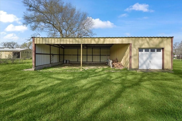 view of outdoor structure with a lawn