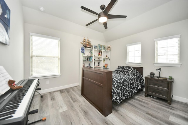 bedroom featuring ceiling fan and light hardwood / wood-style floors