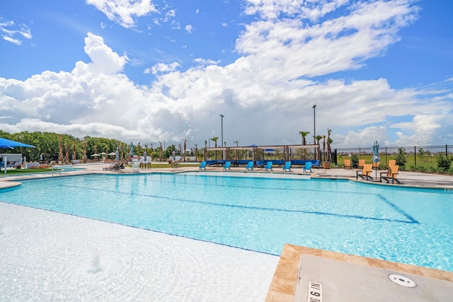 view of swimming pool featuring a patio