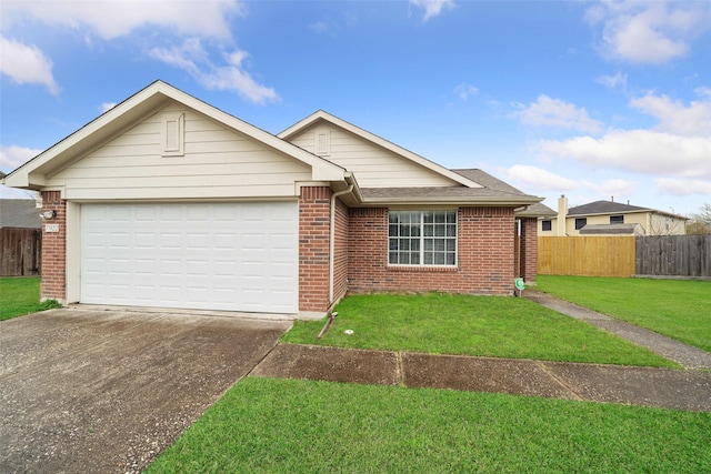 ranch-style house featuring a front lawn and a garage