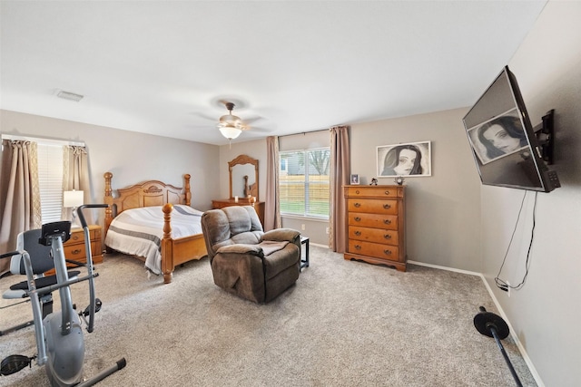 bedroom with ceiling fan and carpet floors