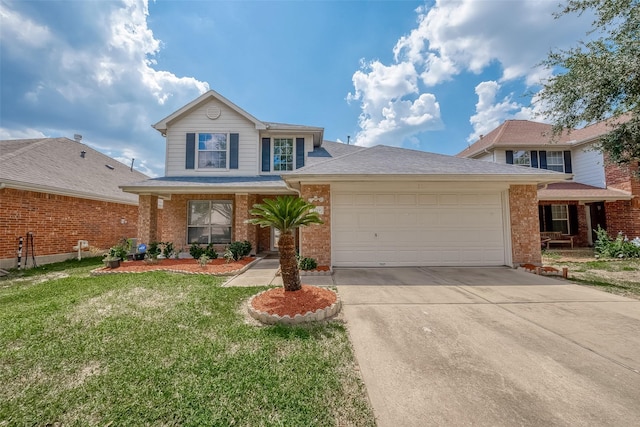 view of property featuring a front yard and a garage