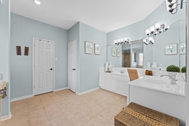 bathroom featuring vanity, tile patterned flooring, and walk in shower