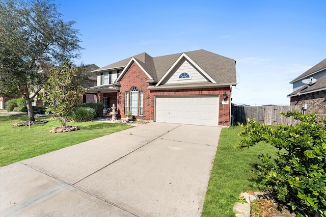 view of front facade with a front lawn and a garage