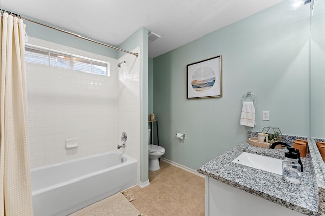 full bathroom featuring vanity, shower / bath combo, tile patterned floors, and toilet