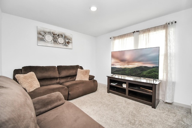 living room with light colored carpet