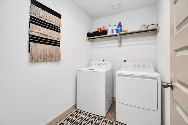 washroom featuring independent washer and dryer