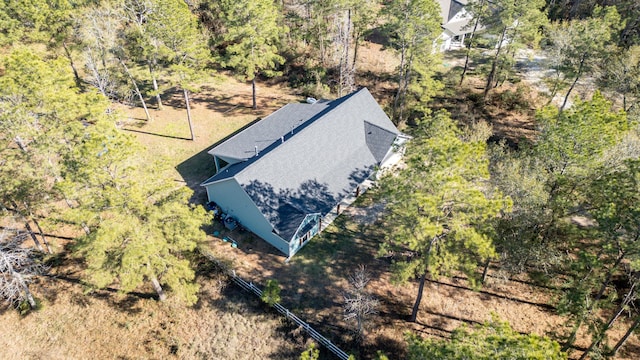 aerial view featuring a view of trees