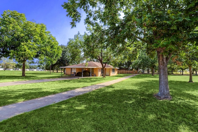 view of home's community featuring a yard