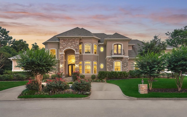 view of front of house with a lawn