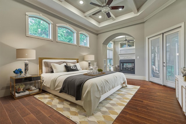 bedroom featuring coffered ceiling, crown molding, ceiling fan, dark hardwood / wood-style floors, and access to exterior