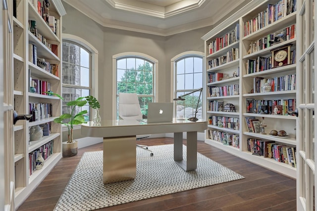 home office featuring dark hardwood / wood-style flooring and crown molding