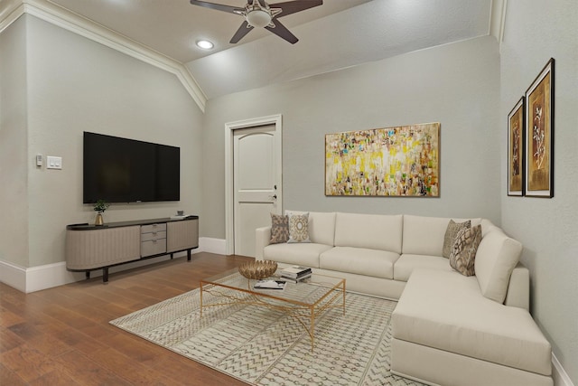 living room with wood-type flooring, crown molding, ceiling fan, and lofted ceiling