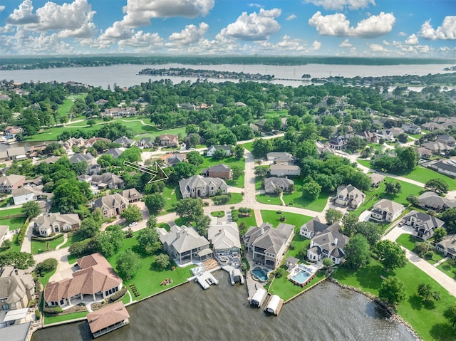 drone / aerial view featuring a water view