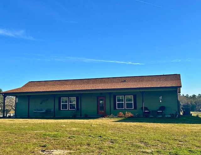 single story home featuring a front yard