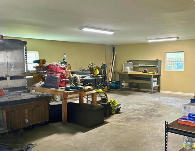 basement with a workshop area