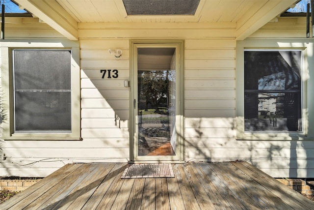 doorway to property with a deck