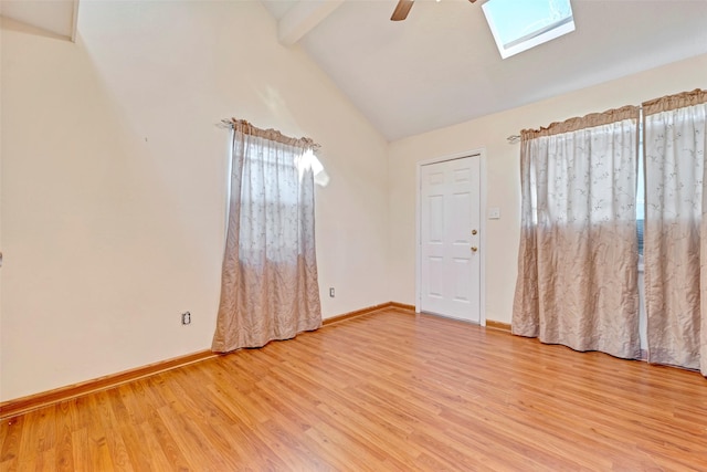 713 Firnat St, Houston, TX 77022 - spare room with light wood-type flooring, a skylight, a ceiling fan, and baseboards