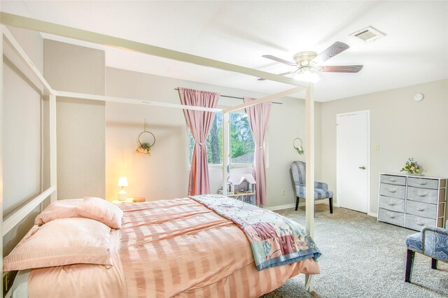 bedroom featuring ceiling fan and carpet floors