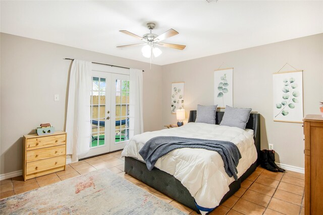 bedroom featuring access to outside, ceiling fan, french doors, and light tile patterned floors