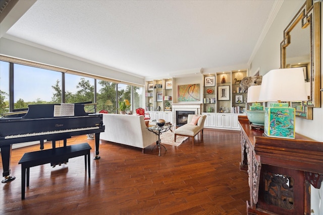 living room with crown molding and dark wood-type flooring