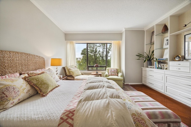 bedroom featuring dark hardwood / wood-style flooring, ornamental molding, and a textured ceiling