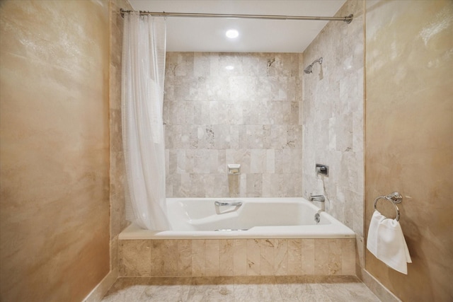 bathroom with shower / tub combo with curtain