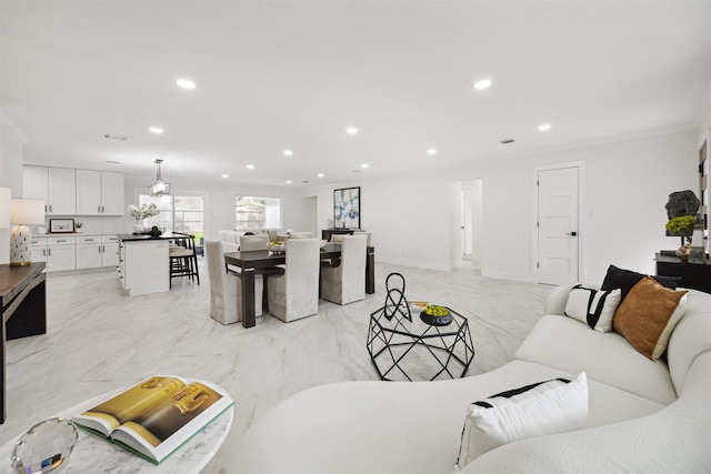 living room featuring ornamental molding