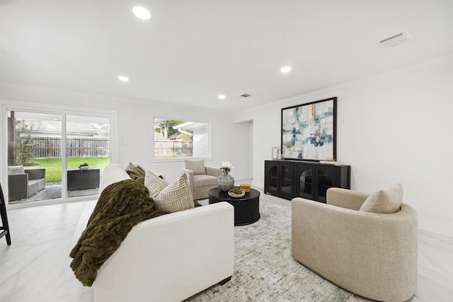 living room featuring ornamental molding