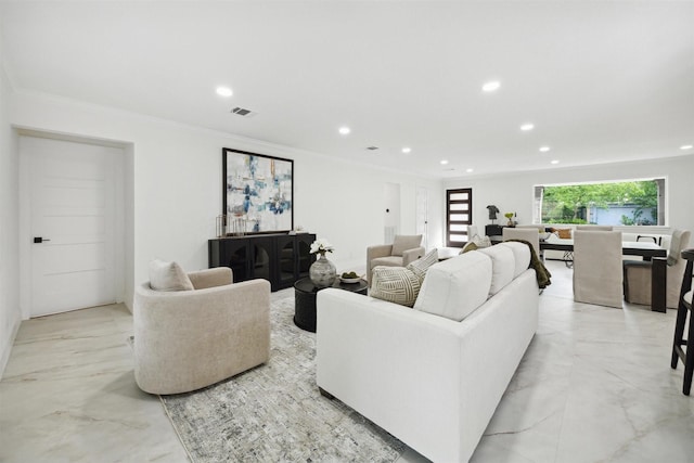 living room with crown molding