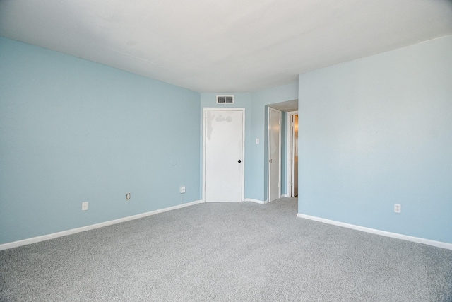 empty room featuring carpet