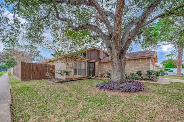 view of front of house with a front lawn