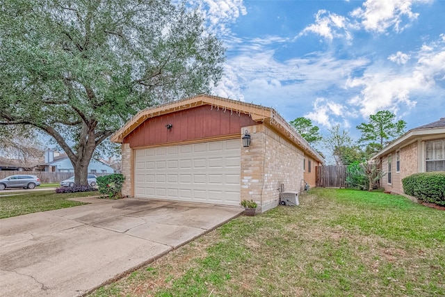 view of property exterior featuring a lawn and a garage