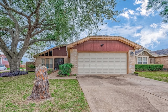 single story home with a front yard and a garage