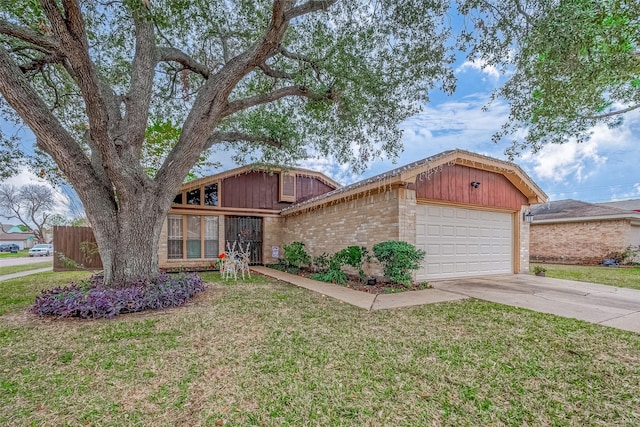 single story home with a garage and a front lawn