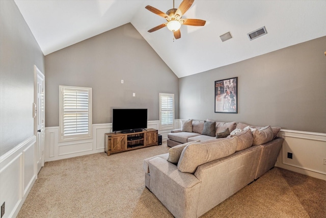 living room with carpet, high vaulted ceiling, and ceiling fan