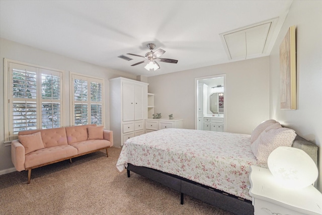 carpeted bedroom featuring connected bathroom and ceiling fan