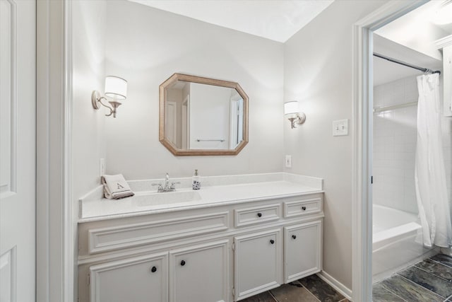 bathroom with vanity and shower / tub combo with curtain