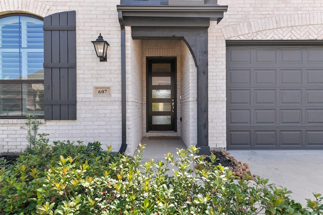 entrance to property featuring a garage