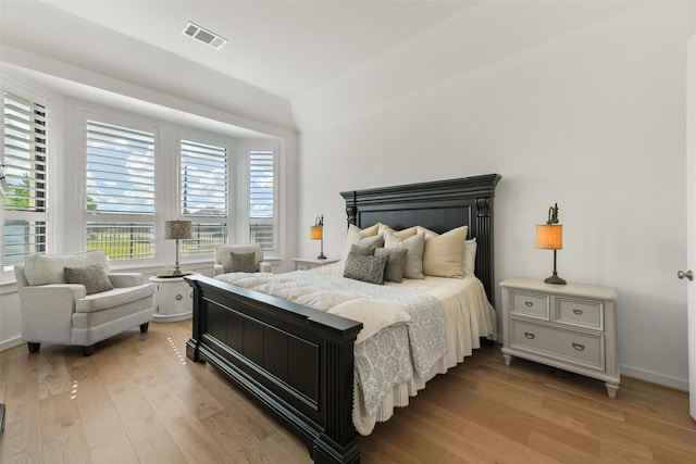 bedroom with light hardwood / wood-style flooring