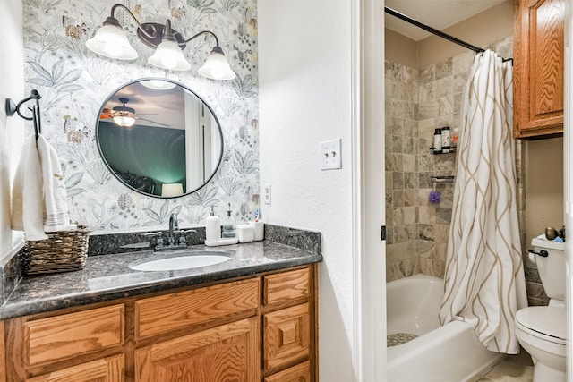 full bathroom with vanity, toilet, and shower / bath combo with shower curtain