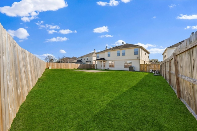 back of house with a lawn, a patio area, and central air condition unit